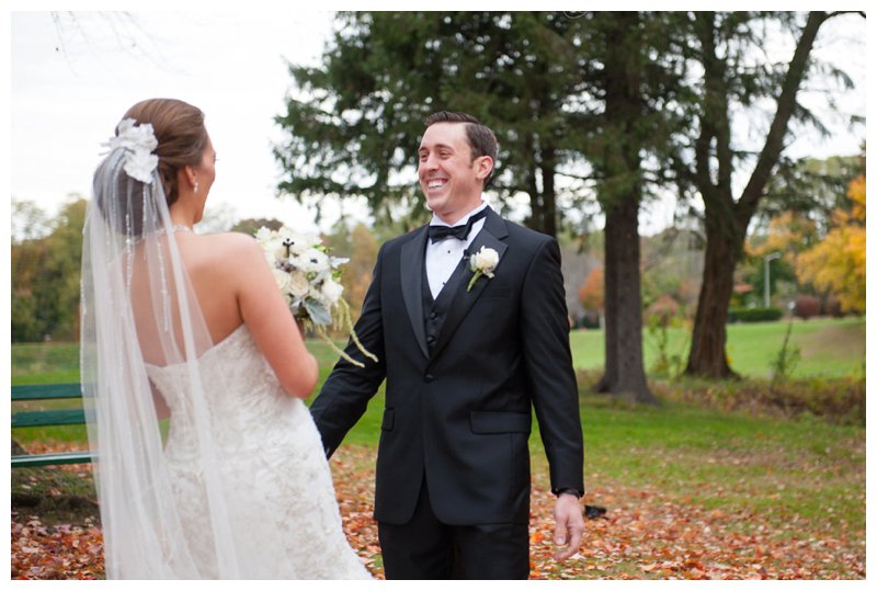fall wedding bride and groom first look