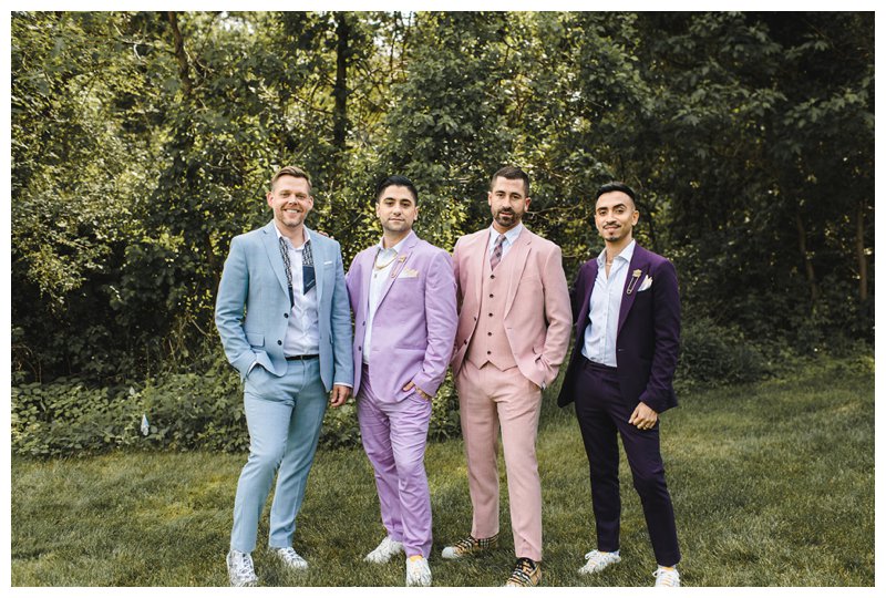 Mismatched wedding party; mismatched groomsmen with colorful suits