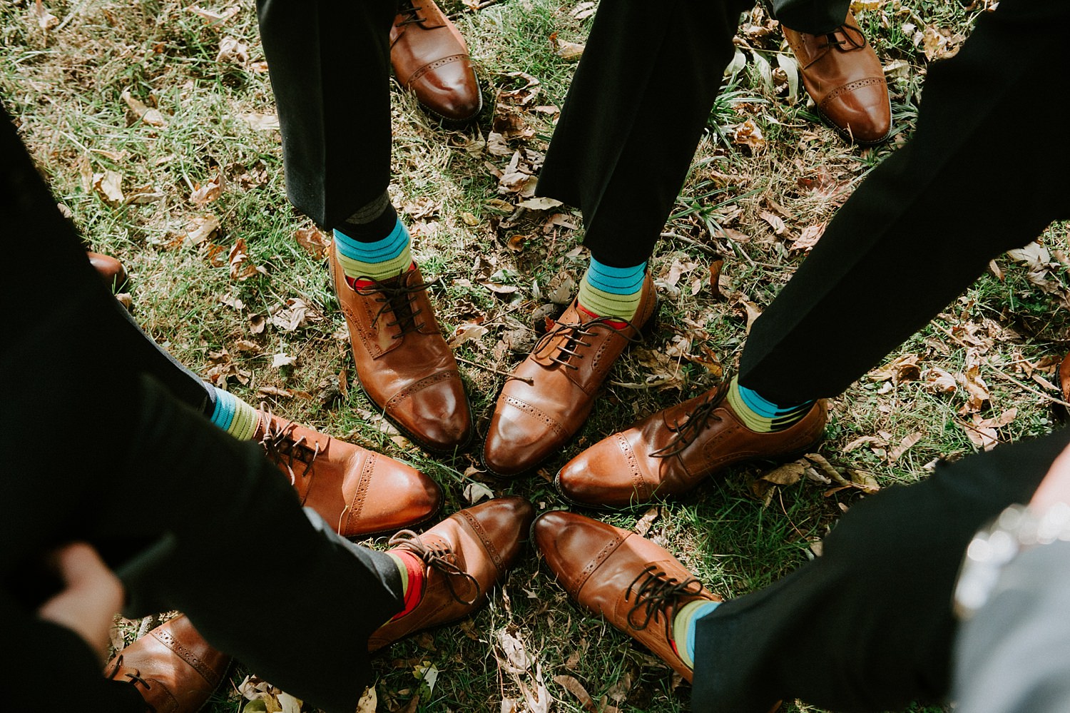 Colorful groom + groomsmen socks at The Webb Barn