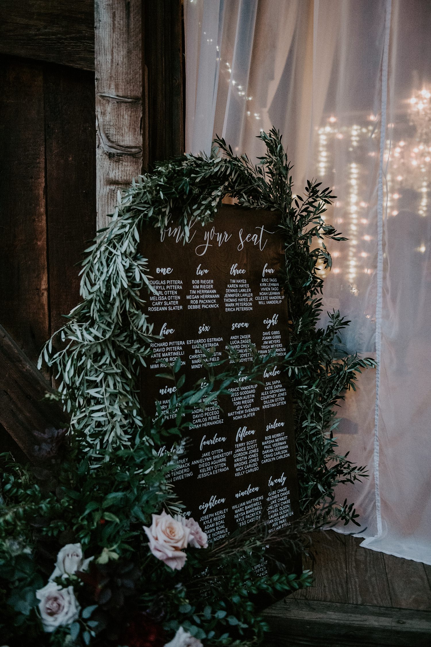 Rustic wooden escort card sign -- find your seat -- at The Webb Barn in Wethersfield, CT